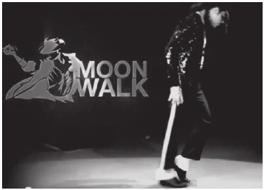 Cena de vídeo de Michael Jackson fazendo o passo de dança Moon Walk.